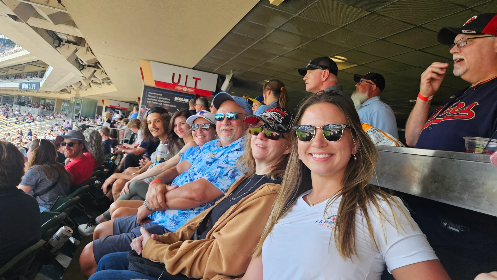 Team Twin Cities colleagues enjoying a baseball game together
