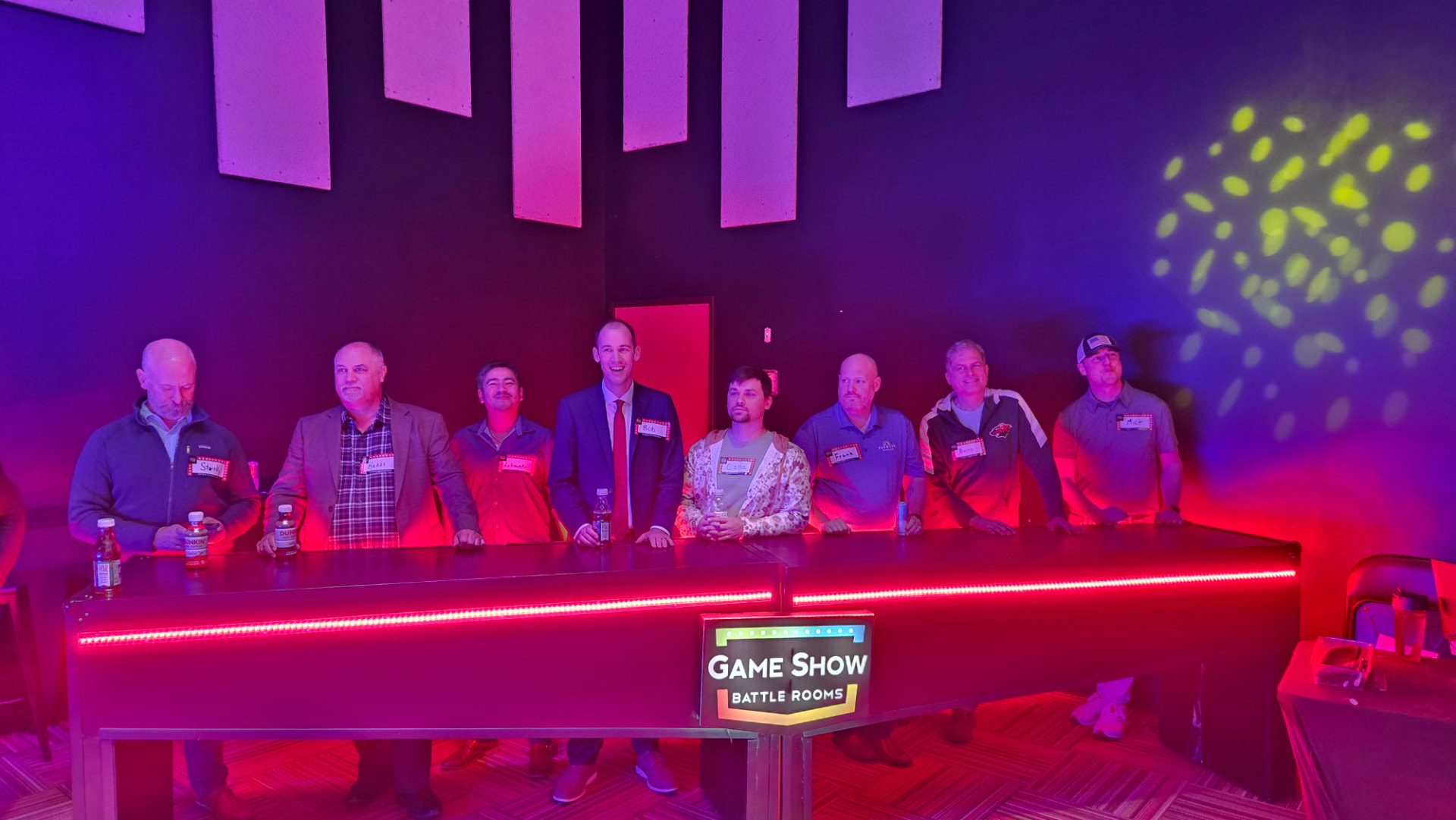 Colleagues competing together at a game-show event